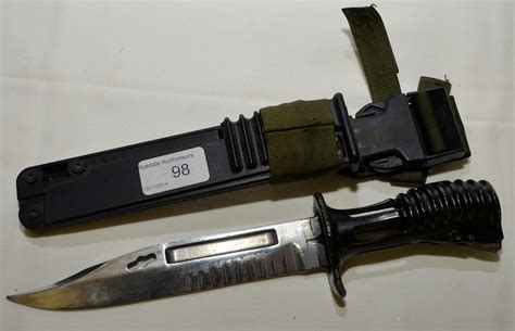 Replica of the British SA80-bayonet with an authentic copy of the bayonet holster made of Cordura. . Sa80 bayonet for sale